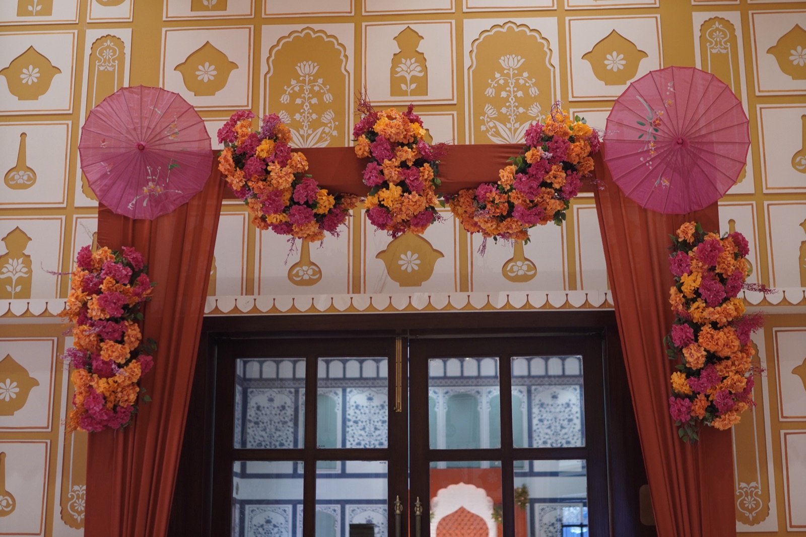 Hand-painted Mehndi welcome signage at a Rajasthani wedding